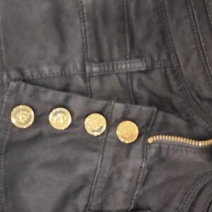 Bebe super high waisted super cute golden button pant.